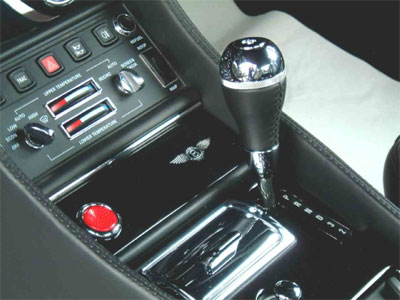 <span class="light">2001</span> Bentley Continental R Mulliner Le Mans gear lever. Red start button & silver winged B inlay.